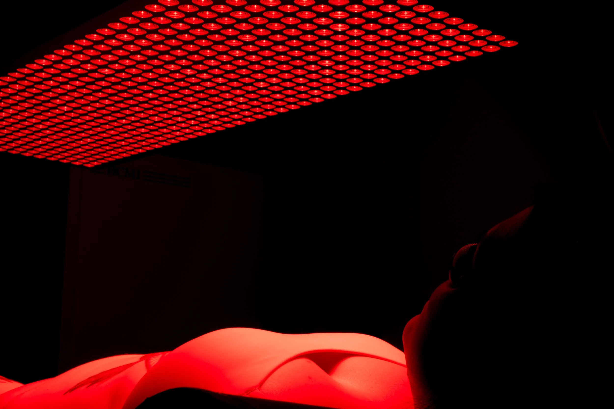 Patient receiving Red Light Therapy at Back to Wellness Chiropractic